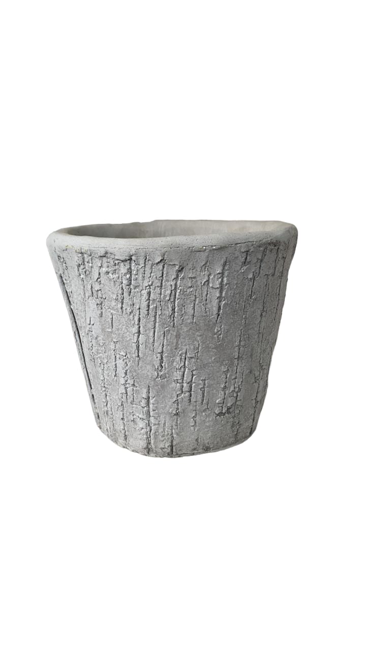 Textured concrete planter pot with rustic stone finish on white background