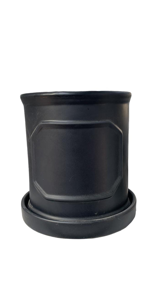 Black plastic plant pot with matching saucer, ideal for indoor gardening