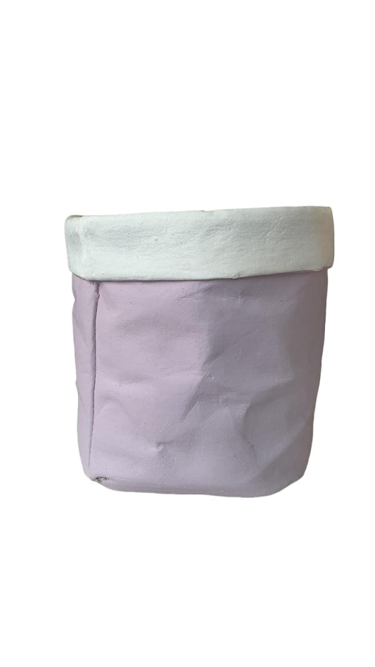 Lavender and white ceramic planter pot with a matte finish, ideal for indoor plants.