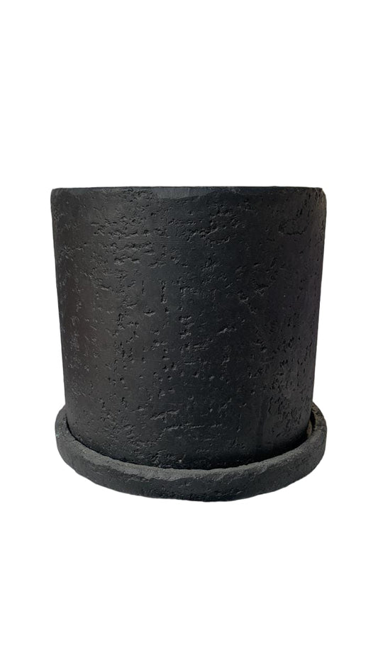 Black textured cylindrical plant pot with matching saucer on white background