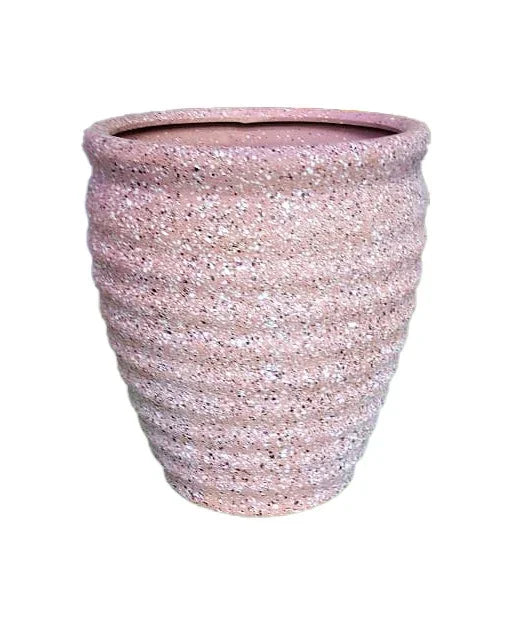 Textured pink ceramic plant pot with speckled finish for indoor or outdoor gardening