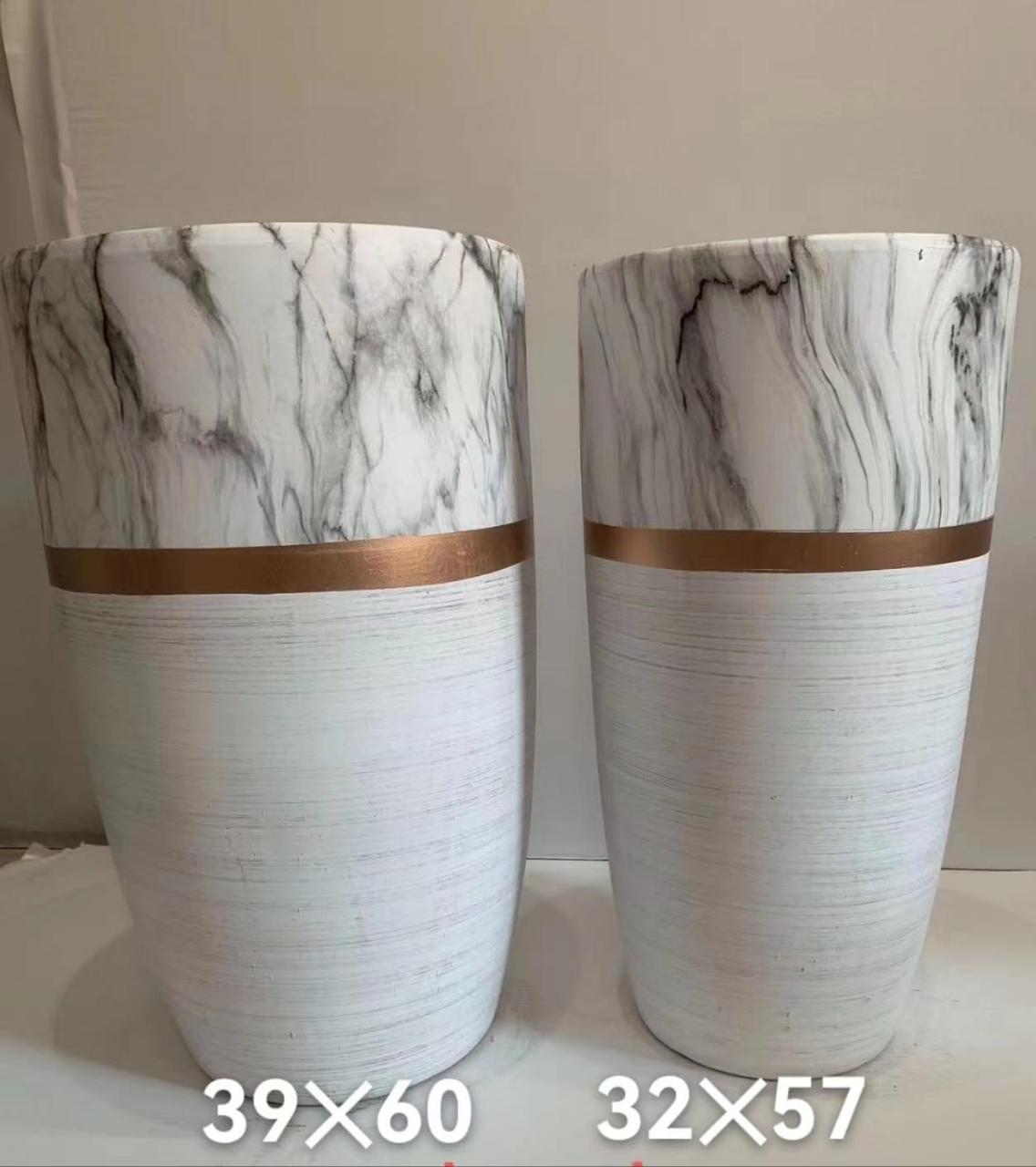 Two white marble-patterned tall plant pots with gold bands, sizes 39x60 and 32x57 cm