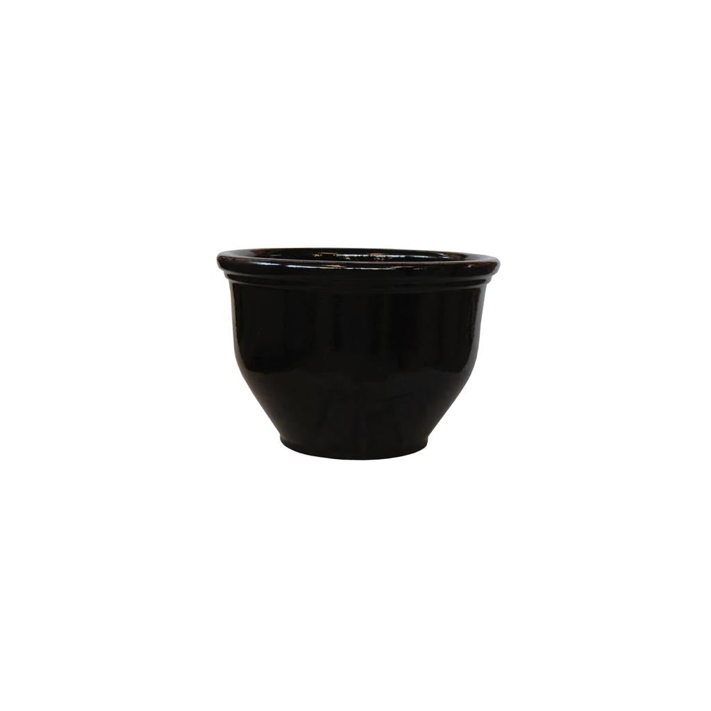 Round black ceramic plant pot with glossy finish on a white background
