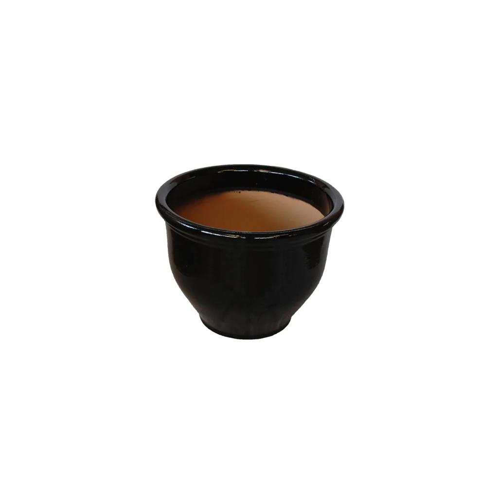 Round black ceramic plant pot with smooth finish on white background