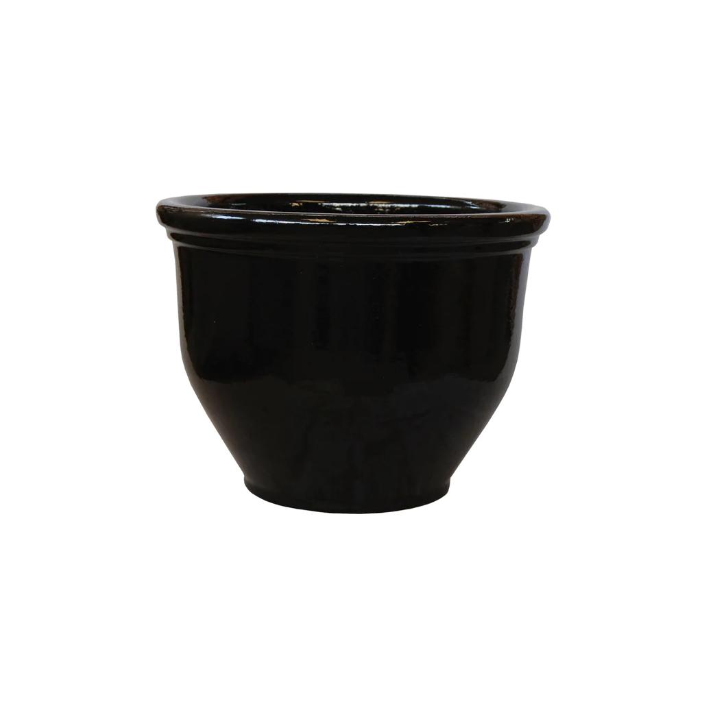 Round black ceramic planter pot with glossy finish, isolated on white background