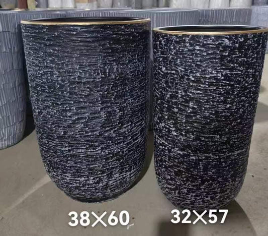 Two large textured black and white plant pots with gold rims in 38x60 and 32x57 sizes
